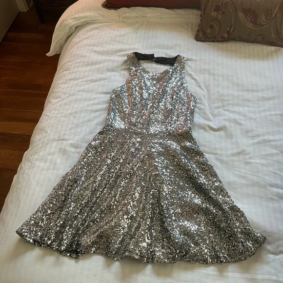 Silver sequin dress. Crystal Doll. Size M